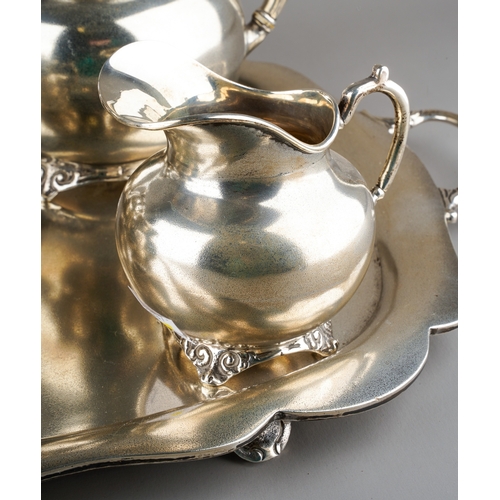 204 - A 20th Century Mexican 925 Sterling silver six piece silver tea service to include: two handled tray... 