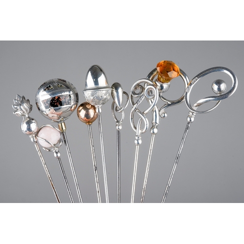 213 - A collection of five various early 20th Century silver mounted Charles Horner hat pins, all hallmark... 