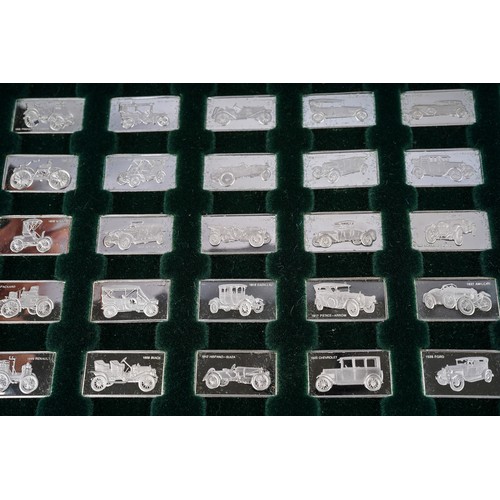 218 - A cased set of John Pinches silver ingots, 'The 100 Greatest Cars' silver miniature collection in pr... 