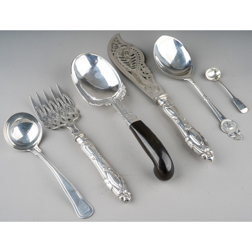 219 - A collection of silver flatware to include: 
1. an American early 20th Century large serving spoon, ... 