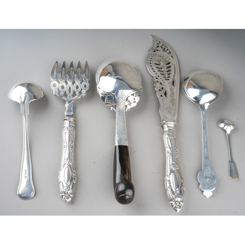 219 - A collection of silver flatware to include: 
1. an American early 20th Century large serving spoon, ... 