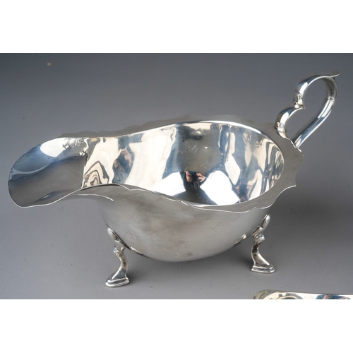 221 - Assorted silver table ware to include: Georgian style sauceboat, by AJZ, Birmingham, 1911; Victorian... 