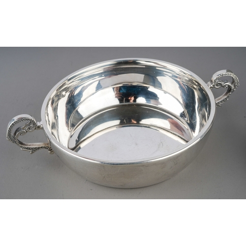 226 - A Modern silver two handled plain circular tasting bowl, ornate hallmarked by Francis Howard, Sheffi... 