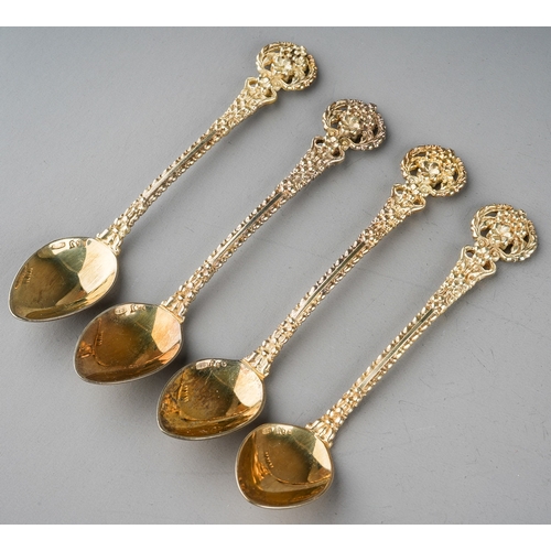 234 - A set of four Russian 916 standard silver gilt ornate coffee spoons, the bowls stamped, gross weight... 