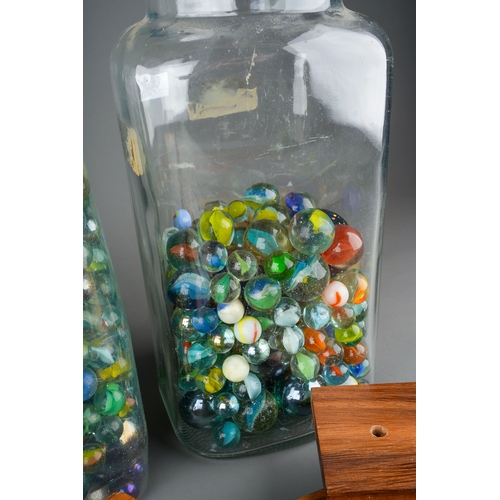 92 - A large collection of assorted marbles in various sizes together with vintage Dominos, playing cards... 