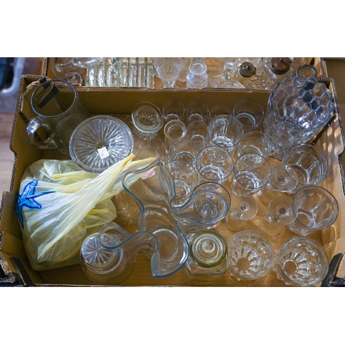 100 - Assorted collection of moulded and cut glass to include: decanters, dishes, glasses, condiments, vas... 