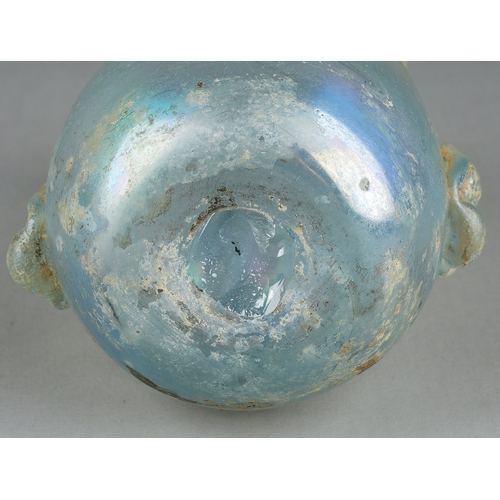 101 - A Roman iridescent glass vase with applied lower section handles, approx 12cm high