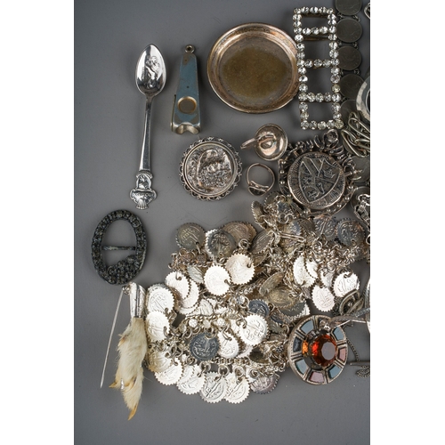 111 - A collection of silver and white metal jewellery, including chains, watch chains, brooches, pendants... 