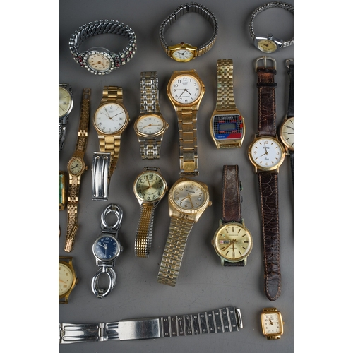 112 - A quantity of ladies and gent's wristwatches, including Sekonda, Rotary etc