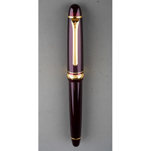 361 - Two Japanese Sailor fountain pens both with 14k gold nibs stamped 14K 585 bodies in purple and gilt ... 