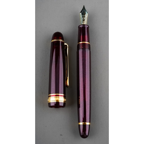 361 - Two Japanese Sailor fountain pens both with 14k gold nibs stamped 14K 585 bodies in purple and gilt ... 