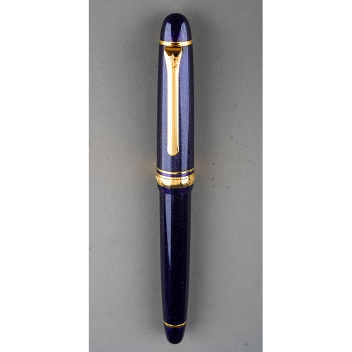 361 - Two Japanese Sailor fountain pens both with 14k gold nibs stamped 14K 585 bodies in purple and gilt ... 