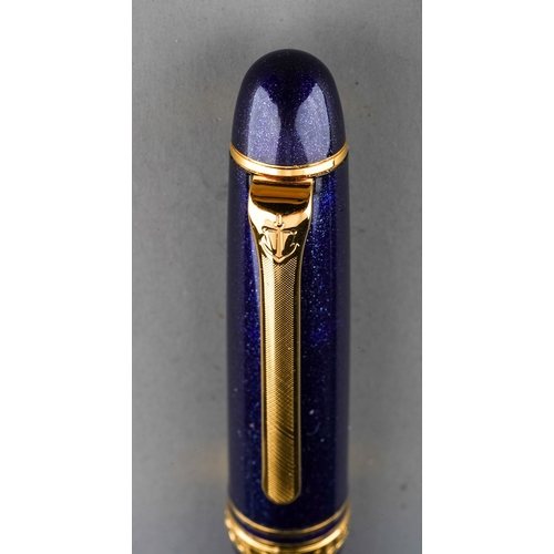 361 - Two Japanese Sailor fountain pens both with 14k gold nibs stamped 14K 585 bodies in purple and gilt ... 