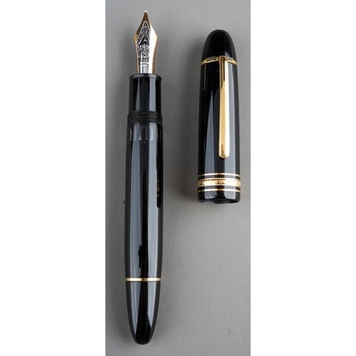 366 - A large Montblanc Meisterstuck no. 149 black fountain pen with gilt fittings, the 14K gold nib stamp... 