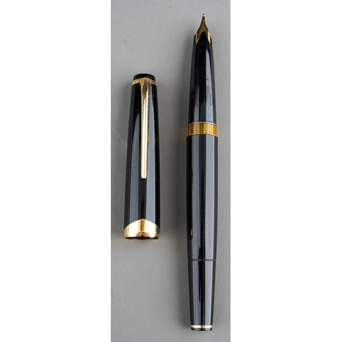 368 - A vintage Montblanc Meisterstuck no 12 black  fountain pen with gilt fittings, yellow metal nib (unt... 