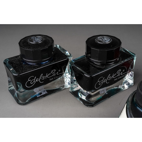 404 - Four bottles of Edelstein Pelikan bottled ink in Sapphire, Jade, Mandarin, Topaz and Sheaffer bottle... 