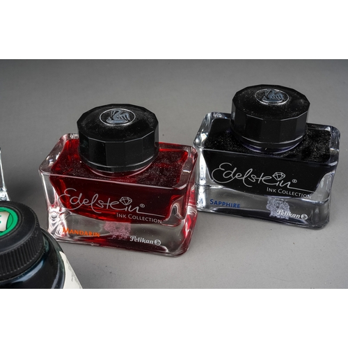 404 - Four bottles of Edelstein Pelikan bottled ink in Sapphire, Jade, Mandarin, Topaz and Sheaffer bottle... 