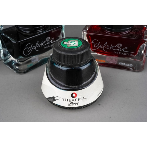 404 - Four bottles of Edelstein Pelikan bottled ink in Sapphire, Jade, Mandarin, Topaz and Sheaffer bottle... 