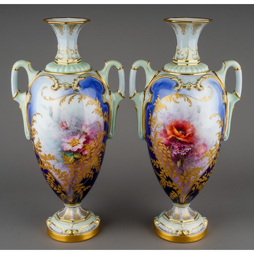 481 - A pair of early 20th Century Royal Worcester vases, shape no: 2256, with flared octagonal necks, the...