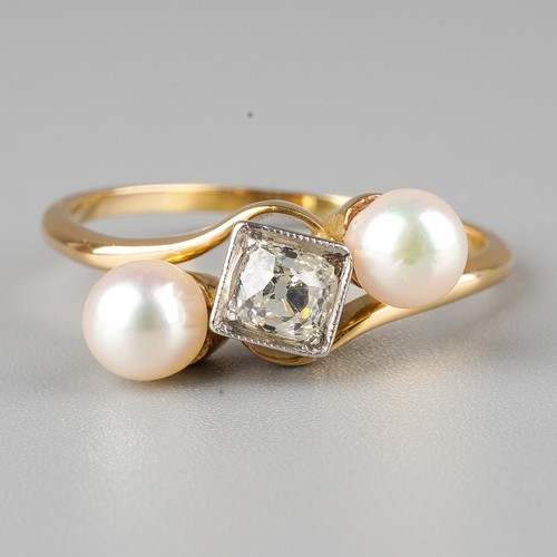 55 - A yellow gold diamond and pearl three-stone ring, set with an old-cut diamond in a square mount, fla... 