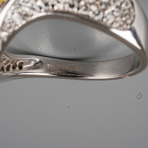 59 - An 18ct white gold yellow and white diamond dress ring, set with a wave of yellow round-brilliant cu... 