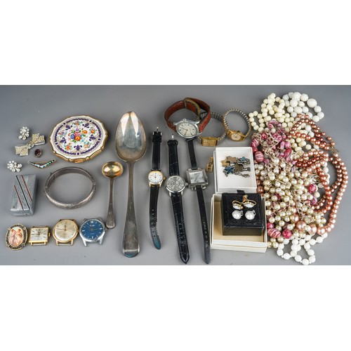 62 - A collection of costume jewellery, including a silver bangle, beads, necklaces, brooches, earrings, ... 