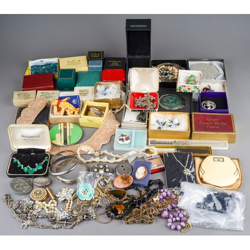 63 - A collection of jewellery, including silver bangles, watch chain, charm bracelet, filigree necklace,... 