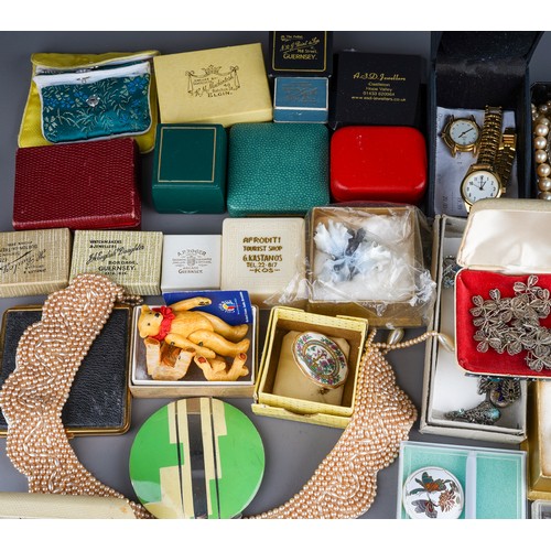 63 - A collection of jewellery, including silver bangles, watch chain, charm bracelet, filigree necklace,... 