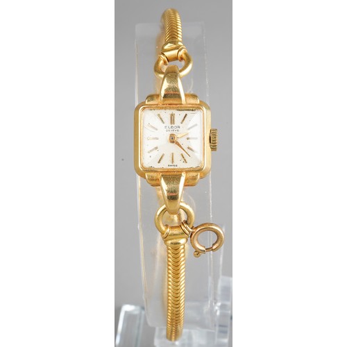 79 - An 18k yellow gold Eldor ladies wristwatch and strap, total gross weight approx 25.3g; together with... 