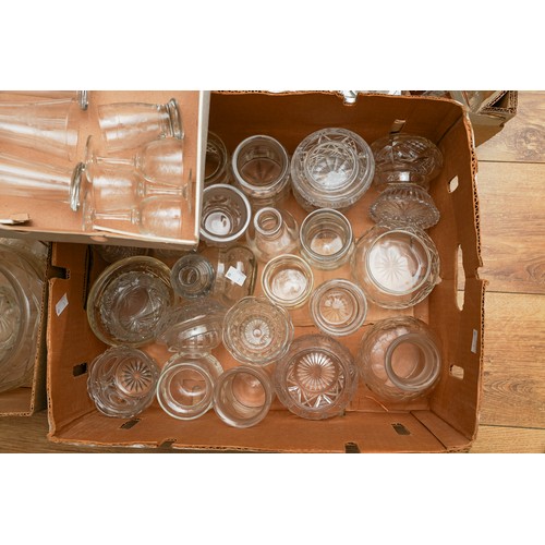 123 - Seven boxes of assorted cut and moulded glass to include: condiment jars, drinking glasses, decanter... 