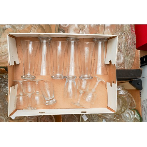 123 - Seven boxes of assorted cut and moulded glass to include: condiment jars, drinking glasses, decanter... 