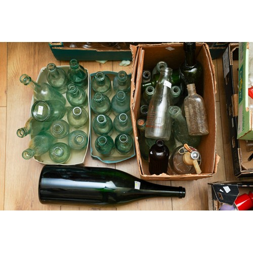 127 - A collection of vintage cob bottles, further bottles, a Scheppes soda stream and a large green magnu... 