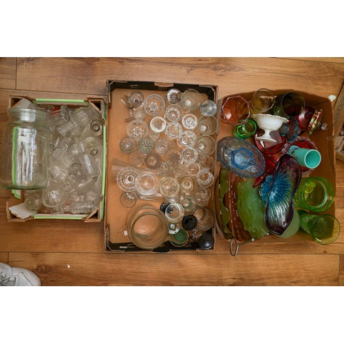 128 - A collection of Georgian style cut drinking glasses together with cut and moulded condiment bottles,... 