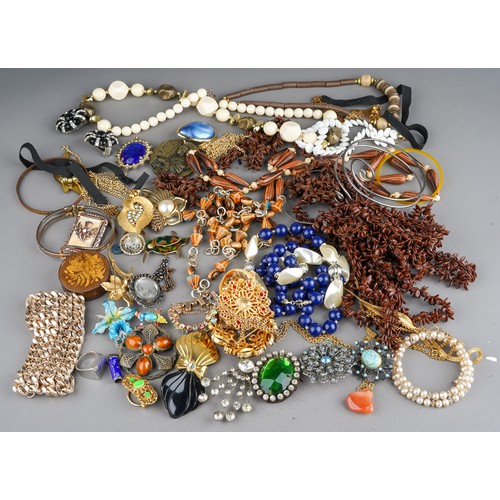 166 - A quantity of costume jewellery, including brooches, beads, earrings, necklaces, bangles, etc, inclu... 