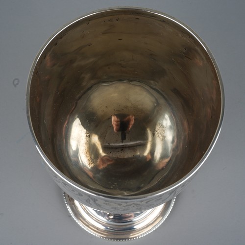 211 - A Victorian silver goblet, engraved scrolling detail, vacant cartouche, on a stepped circular base, ... 