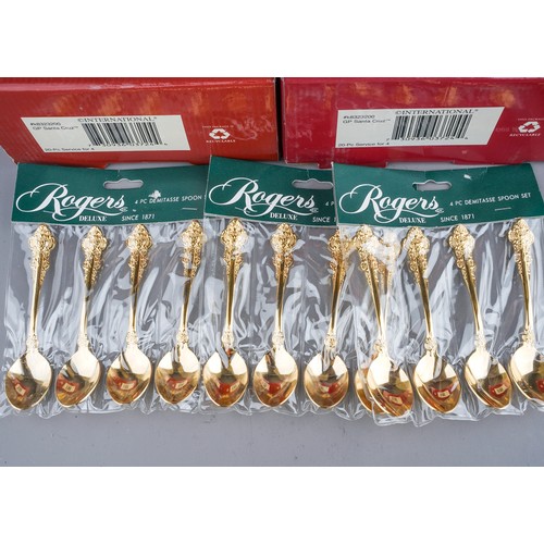 233 - Two boxed gold plated Santa Cruz 20 piece cutlery sets together with another 20 piece loose set and ... 