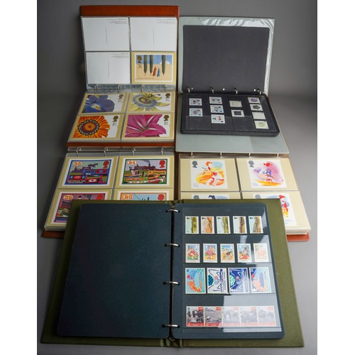 250 - A collection of approximately 440 Royal Mail stamp issue postcards presented in three purposed album... 