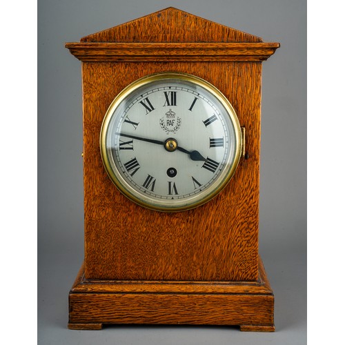 269 - WW2 British RAF cased clock. Possibly from an Officers Mess. The face with roman numerals, with RAF ... 