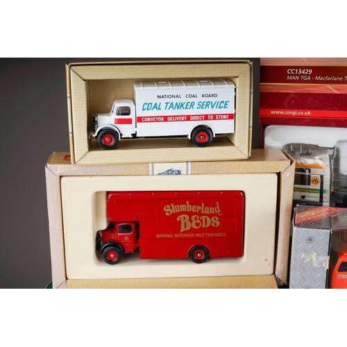 313 - Corgi classics and others.  12 boxed vehicles to include super haulers (12)