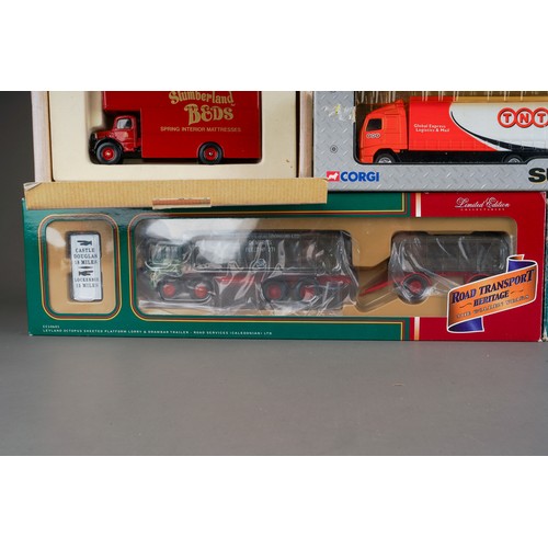 313 - Corgi classics and others.  12 boxed vehicles to include super haulers (12)