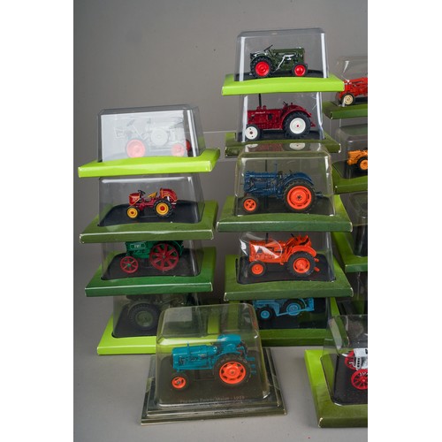 315 - A very large collection of approx. 80 Hachette small scale farming and construction vehicles in blis... 