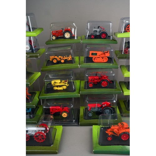 315 - A very large collection of approx. 80 Hachette small scale farming and construction vehicles in blis... 