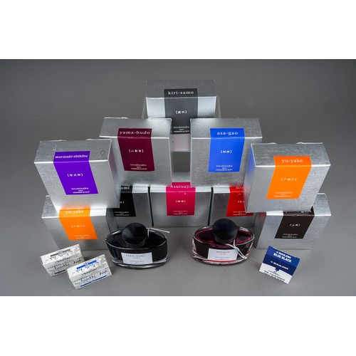 403 - A collection of ten Pilot Iroshizuku ink bottles, various colour pen inks, in oval glass bottles wit... 