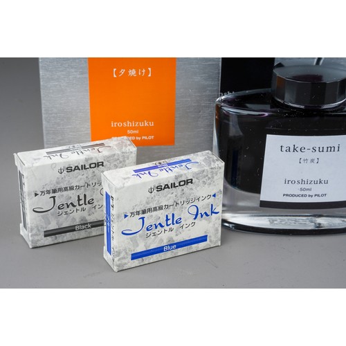 403 - A collection of ten Pilot Iroshizuku ink bottles, various colour pen inks, in oval glass bottles wit... 