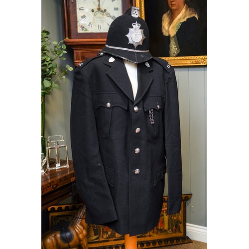 457 - Vintage Cambridgeshire police uniform including helmet, circa 1990