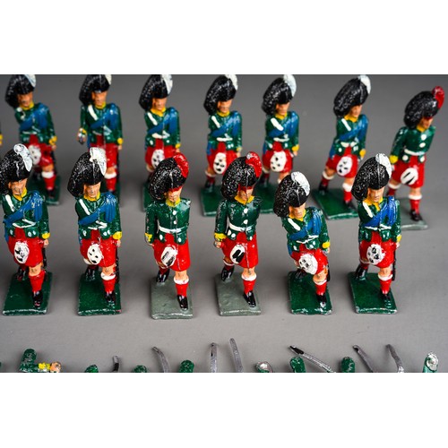 348 - Vintage Britains or similar a collection of 32 white metal Scottish Black Watch model soldiers with ... 