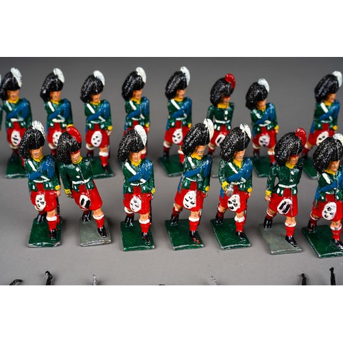 348 - Vintage Britains or similar a collection of 32 white metal Scottish Black Watch model soldiers with ... 