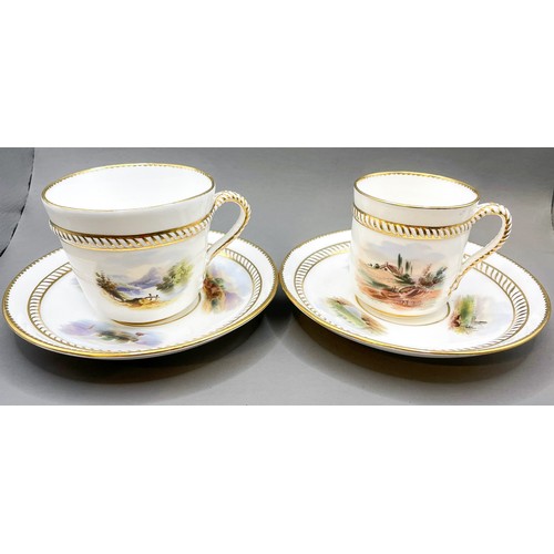 173 - Two English porcelain cups and saucers with hand painted panels and rope handles