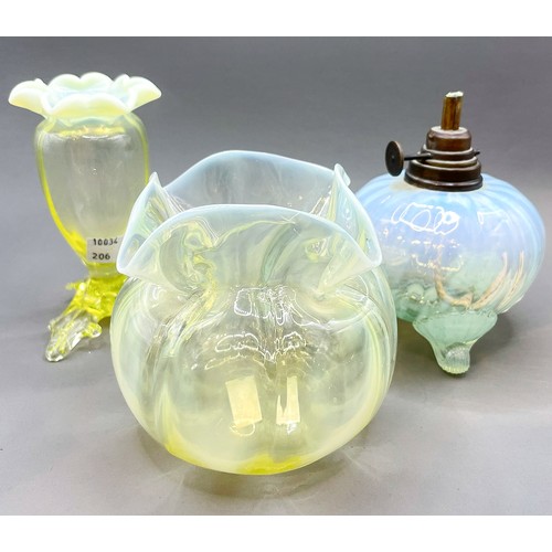 179 - 3 opaline / uranium glass pieces to include 2 vases and a small oi lamp base, tallest approx. 11 cm