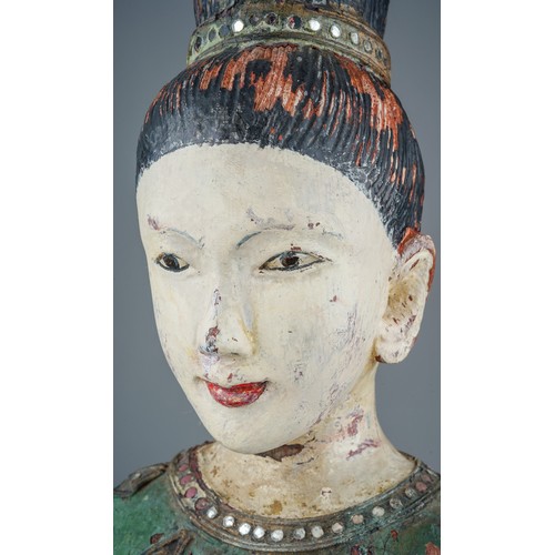 535 - An Asian decorative painted wood bust of a young woman, with jewel decoration, approx 41cm high